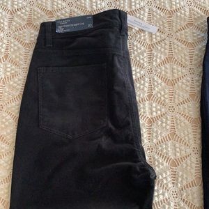 Five pocket velveteen jeans—one navy and one black